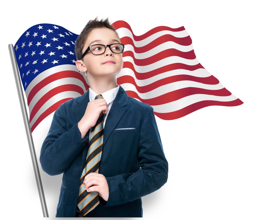 A boy in formal wear wearing glasses and US Flag